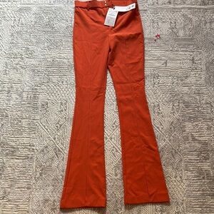 Vibrant Orange Flare Pants with 70s-Inspired Boot Cut